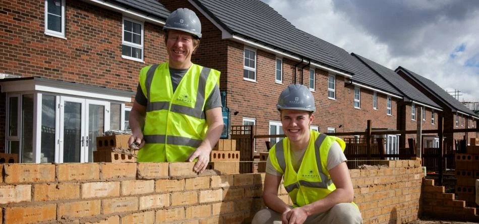 Father and son bricklayers, Sean Atkinson and Sean Atkinson Jr, working on the Belle Vue development