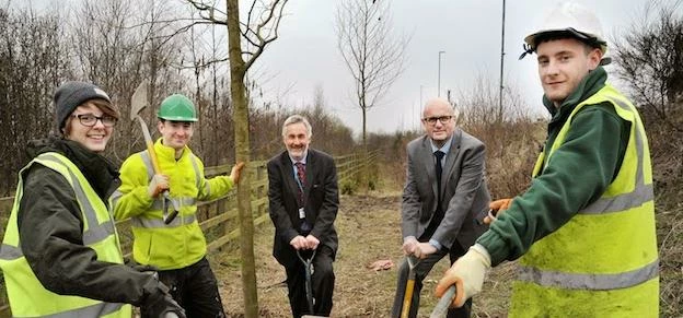  (L-R back) - Cllr Richard Lewis and Cllr Mark Dobson with council apprentices who helped plant over