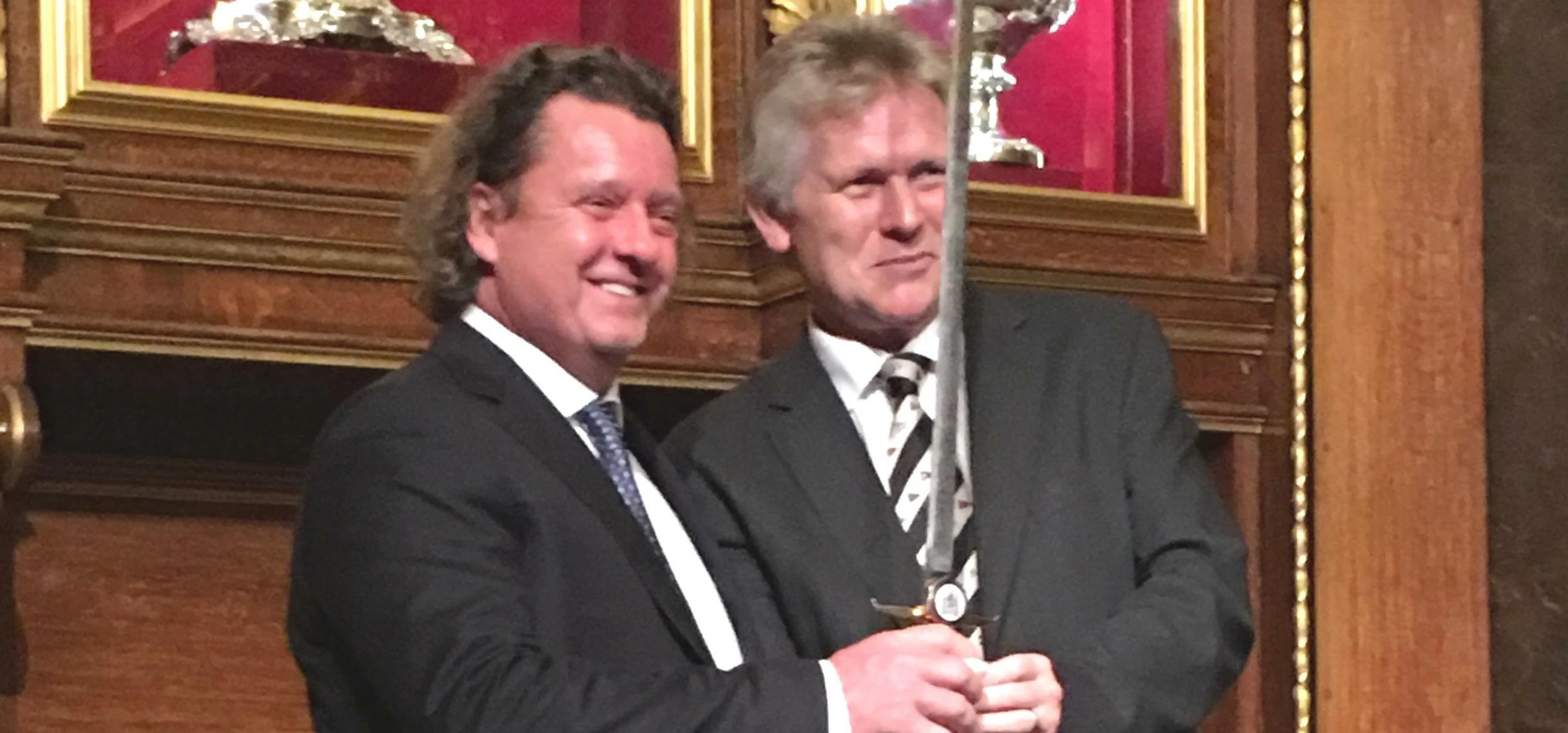 David Kempley (left), CEO of Troy Foods, being presented with the Sword of Honour award from the Bri