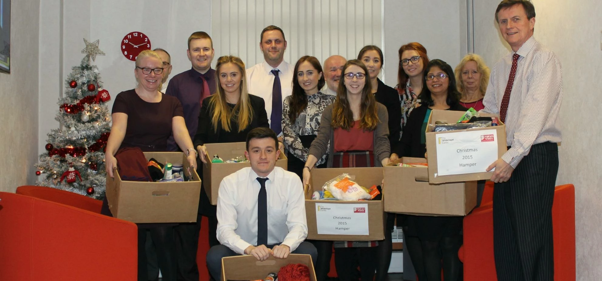 The team at Haines Watts Liverpool with their Christmas donations to The Whitechapel Centre