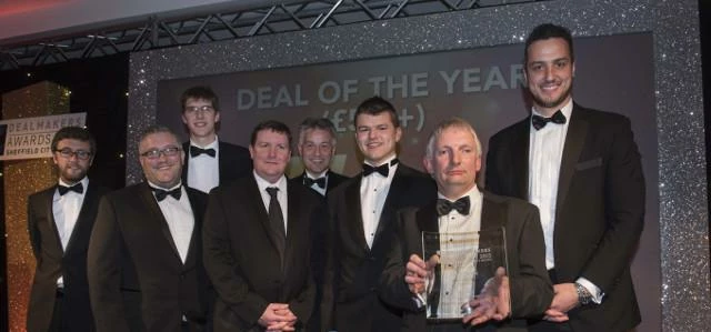 Celebrating success: Patrick Abel from Hart Shaw (4th from left) and Paul Trudgill from hlw Keeble H