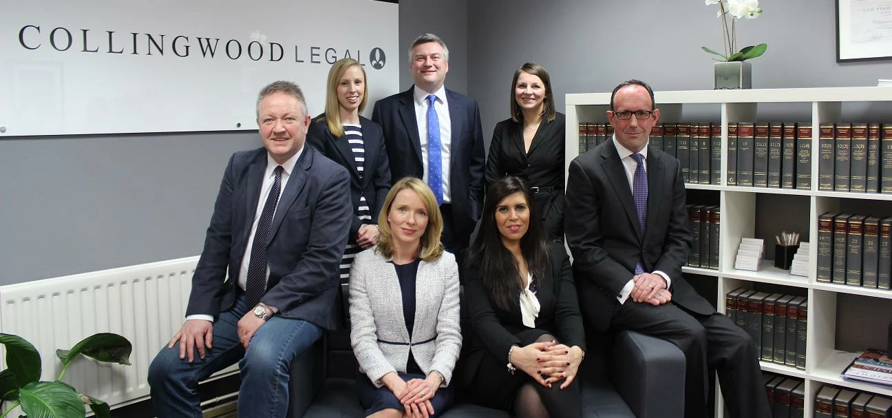 The Collingwood Legal team led by Paul McGowan (back centre)
