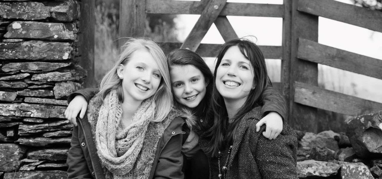 Suzy Mitchell pictured with her daughters Helena and Olivia