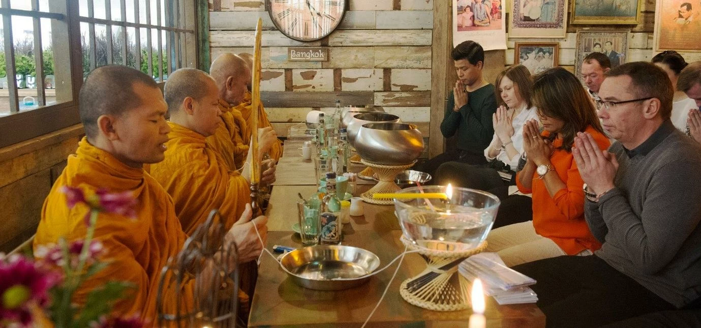 Monks blessing at Thai restaurant Thaikhun prior to opening