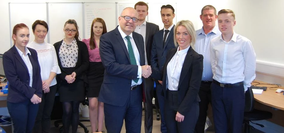 Andy Steel and Sarah Kinnie with other staff at Heir Hunter  UK
