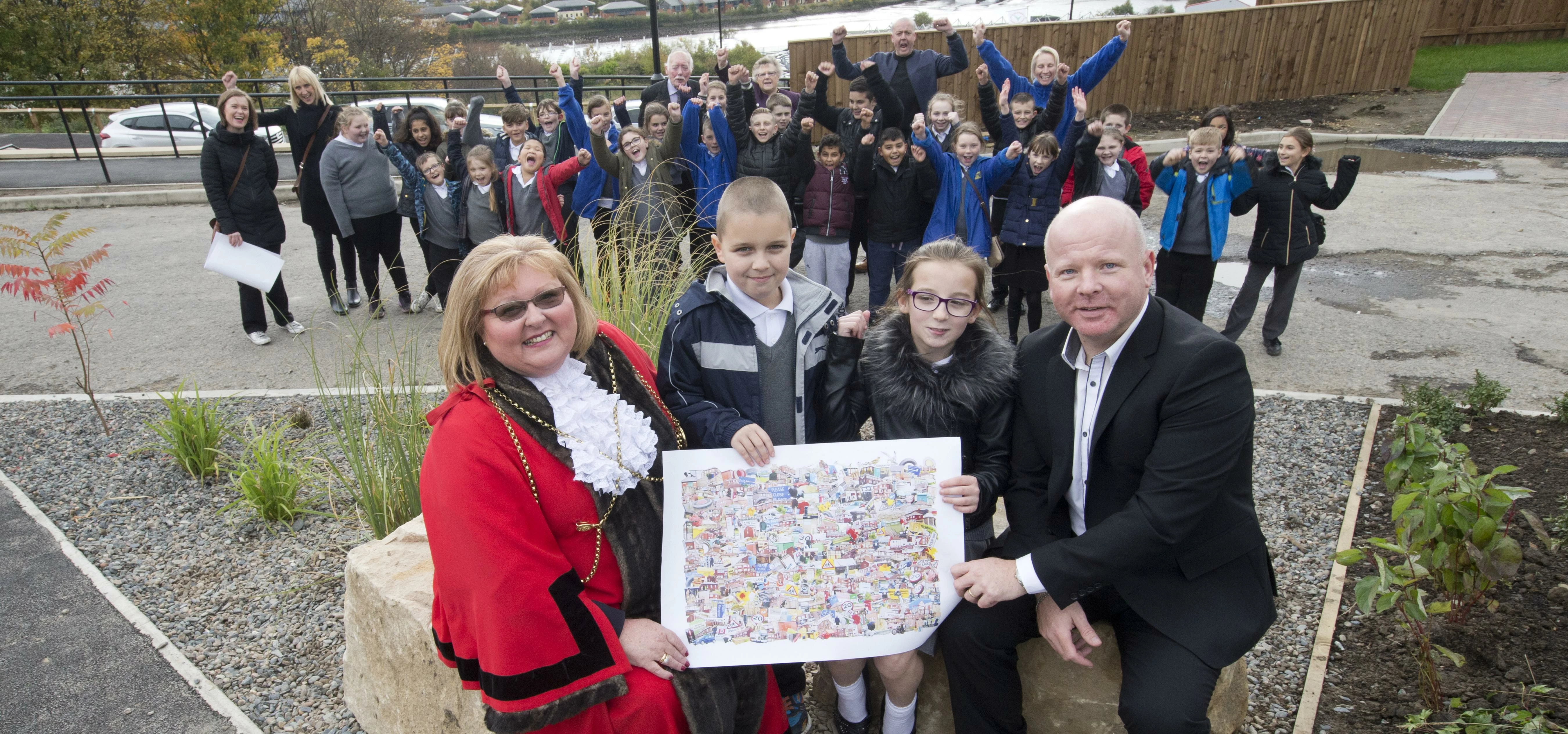 Lord Mayor Hazel Stephenson and NTWDC Development Director Lee McGray are joined by children from Br