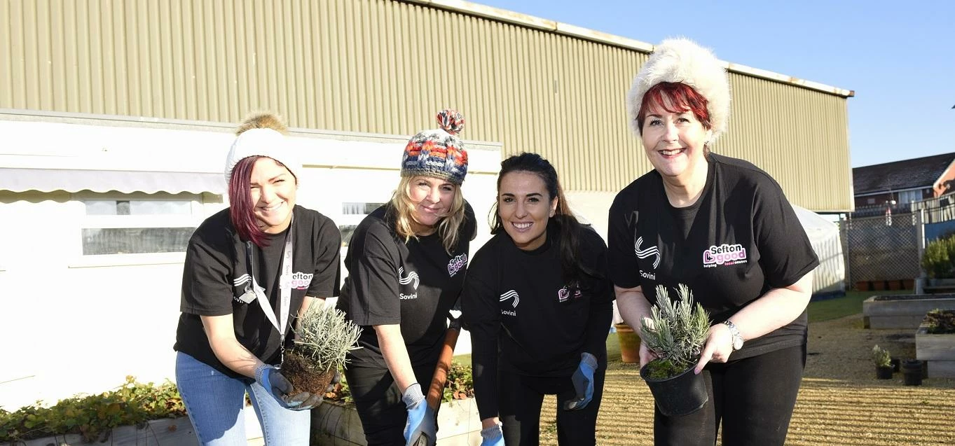 One Vision Housing staff with staff from Sefton4Good