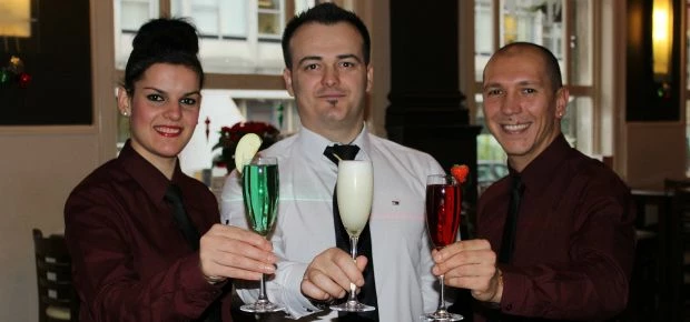waitress Valbona Karemanaj, restaurant manager Toni Karemanaj and waiter Aldo Aubry.