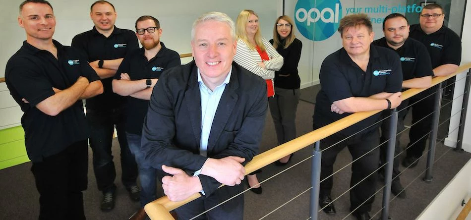 Andrew Metcalfe (front, centre), managing director of Opal, with his team of staff