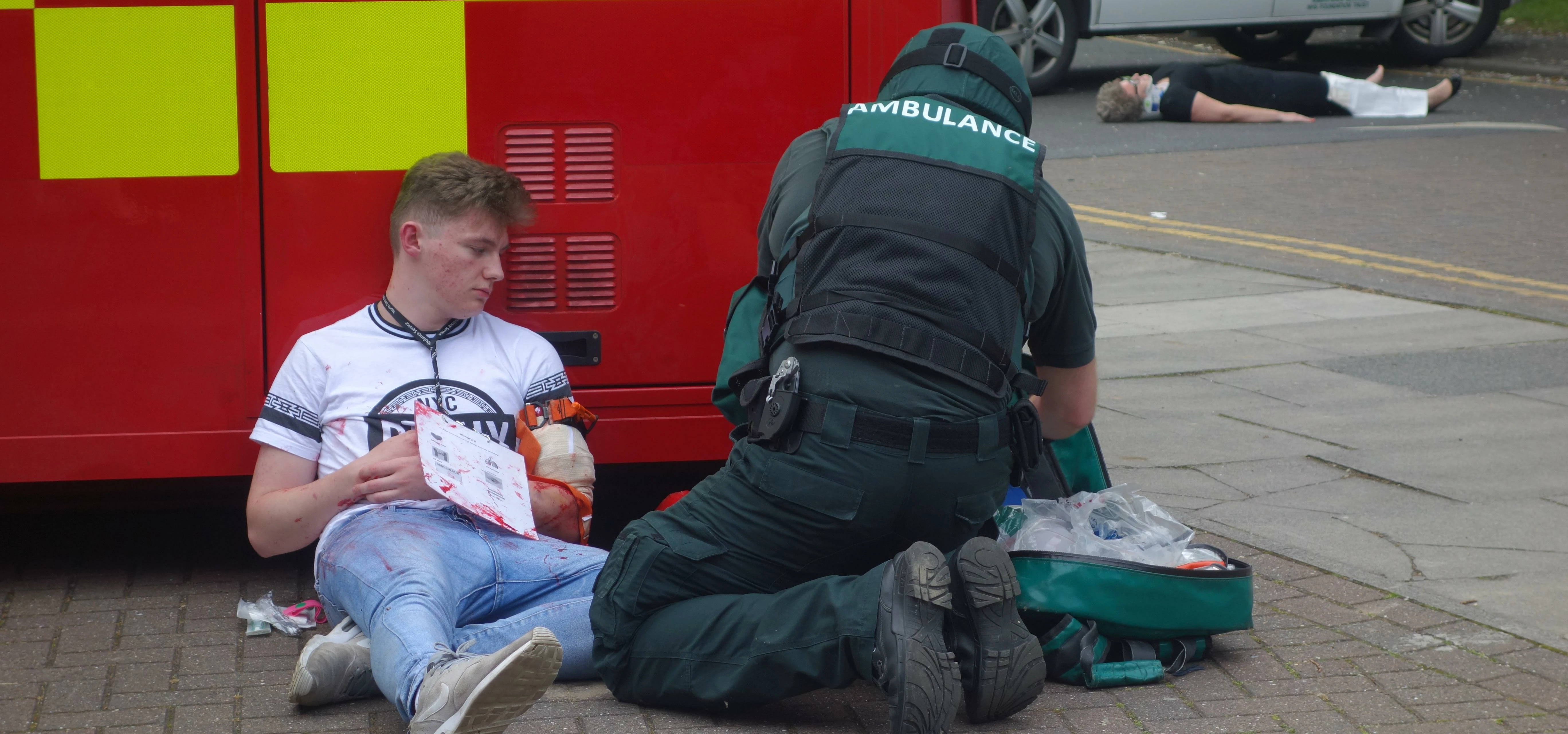 Stockton Riverside College student Reece Durham plays a casualty in large scale emergency services' 