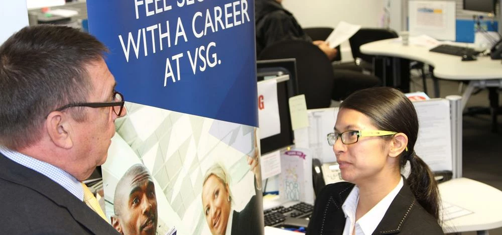 Paul Owen from VSG Securities chatting to potential recruit Jasmine Wahid.