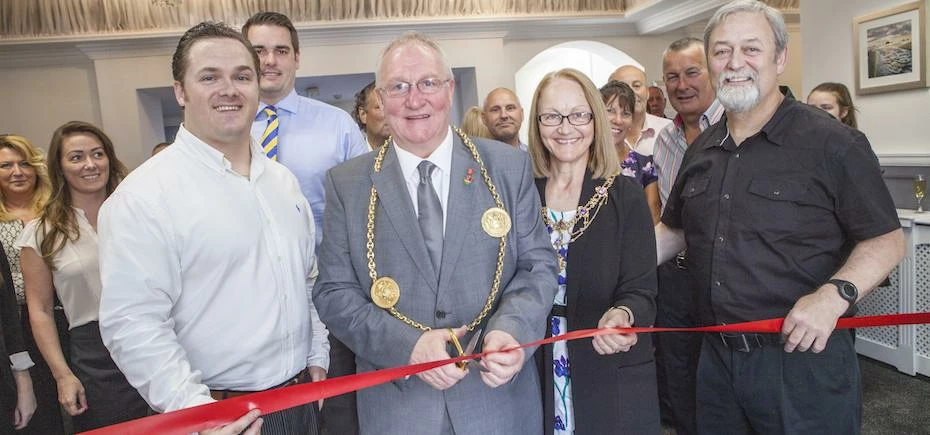 The Lord Mayor, Richard Porthouse, accompanied by the Lady Mayoress, Patricia Porthouse, cut the cer