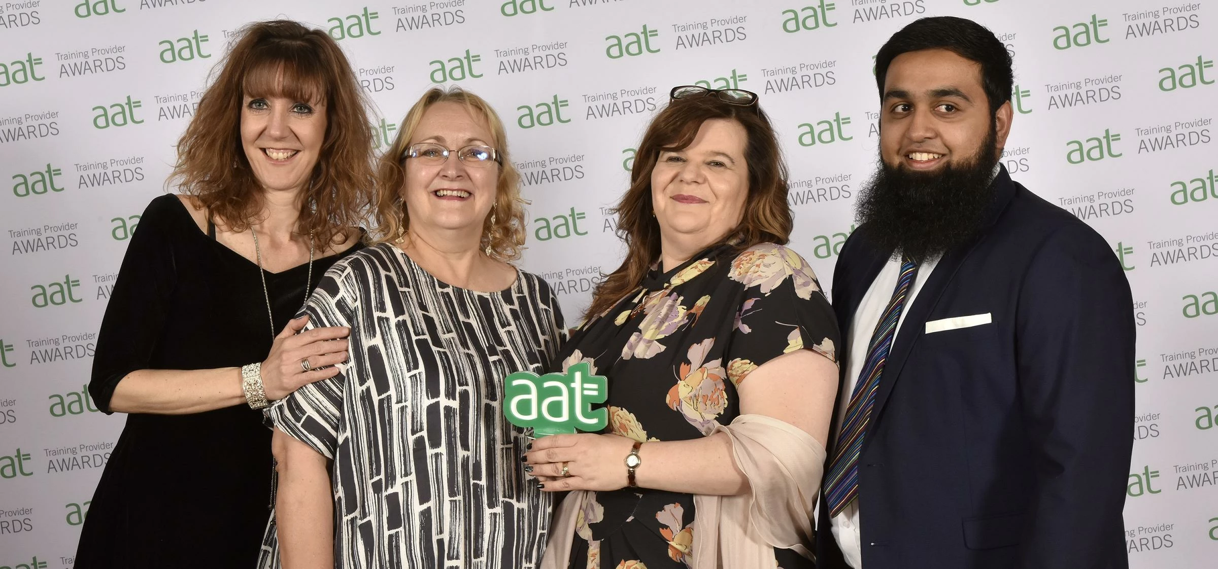 Receiving the award on behalf of the College is L-R Georgina Moran, Kaye Dickinson, Susan Lewis and