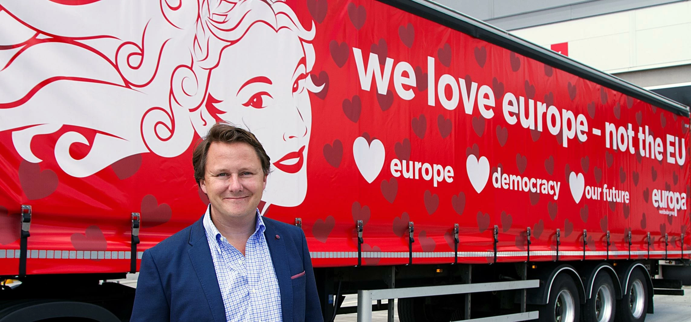 Andrew Baxter from Europa Worldwide unveils his new truck to mark EU Referendum result  