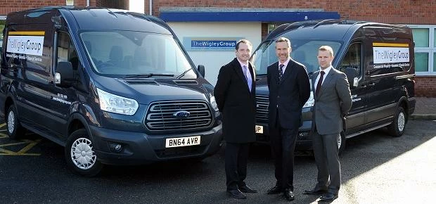 Pictured from left to right: James Davies (The Wigley Group) with Tom Bromwich (Bromwich Hardy) and