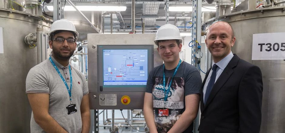 Jamie Ashton, Managing Director at Projex Solutions Ltd with Kirklees College apprentice engineers.