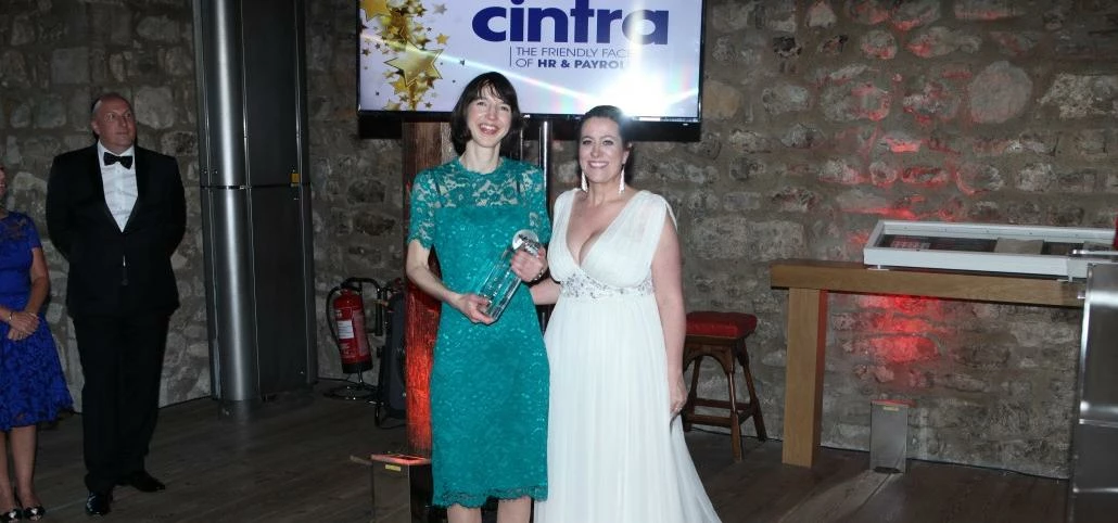 Jess McEvoy collecting Cintra's award at the Global Payroll Awards in 2016