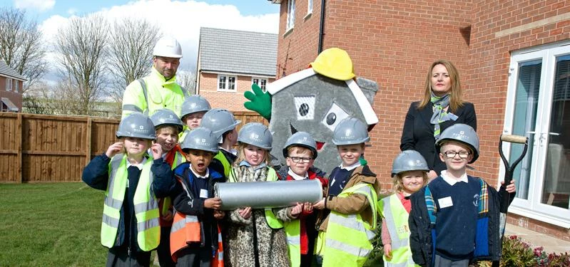 Children from Fountain Primary bury a time capsule at St Andrew's View