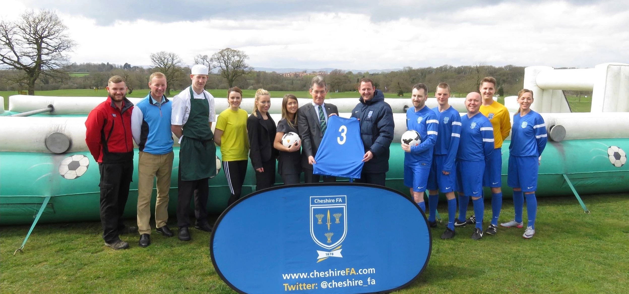 Cheshire FA's CEO, Simon Gerrard and Carden Park's General Manager, Hamish Ferguson together with th