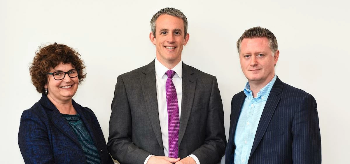 Caroline Pinney and Alex Sealy of Slater Heelis, pictured with Chris Partington (centre)