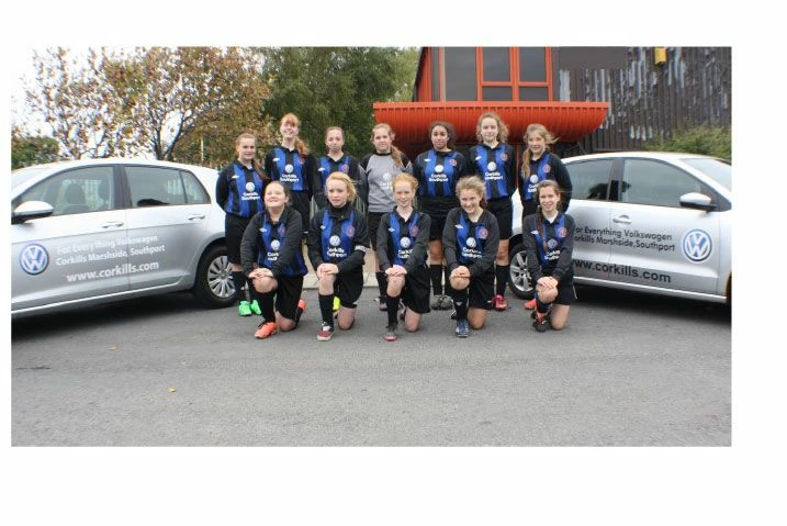 Girls football team scores twice with Corkills 