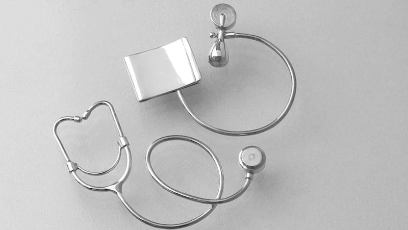 Miniature silver medical instruments.