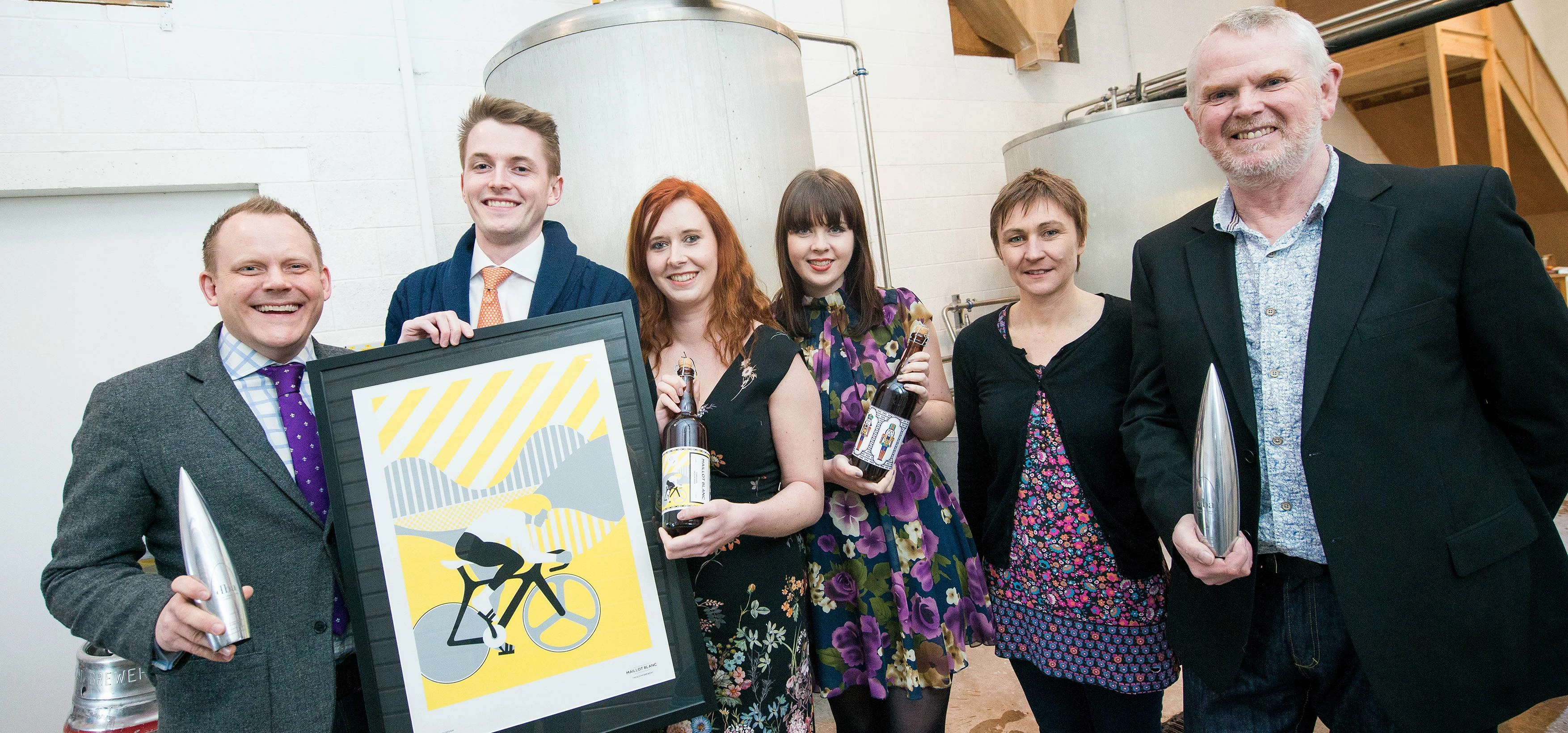 The designers and the clients with their award and designs. L-R: Owen Turner, Ross Brotherston, Lucy