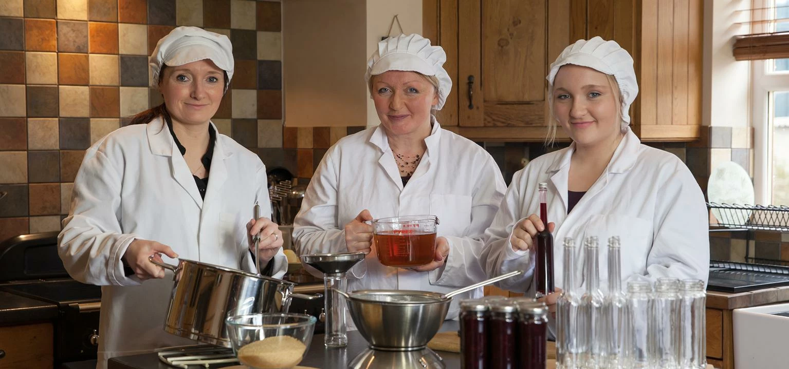 Beri Da team - Victoria, Angela and Anna prepare the fruity vinegar and chutneys ready to be sent to