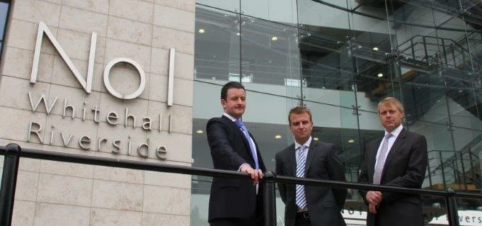 Eamon Fox, David Hidderley and Richard Thornton outside the flagship offices