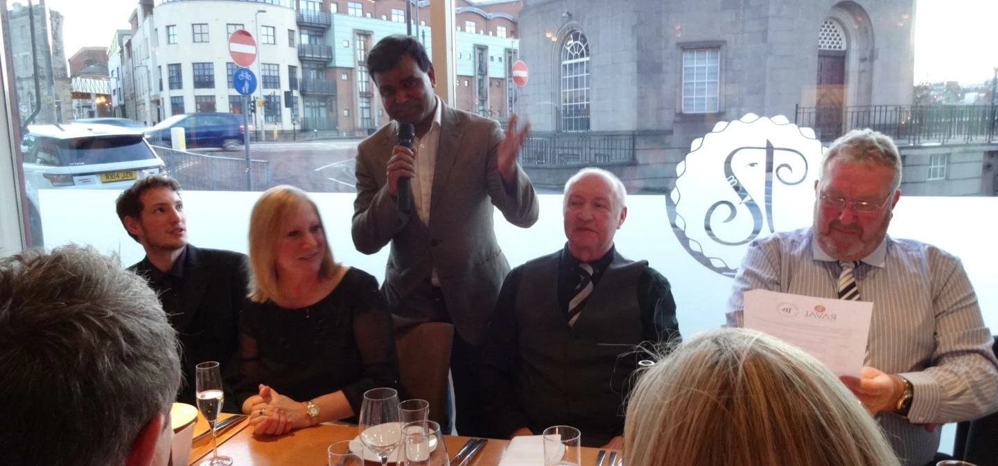 Raval manager Avi Malik speaking at the event, with Jim Thompson on the right