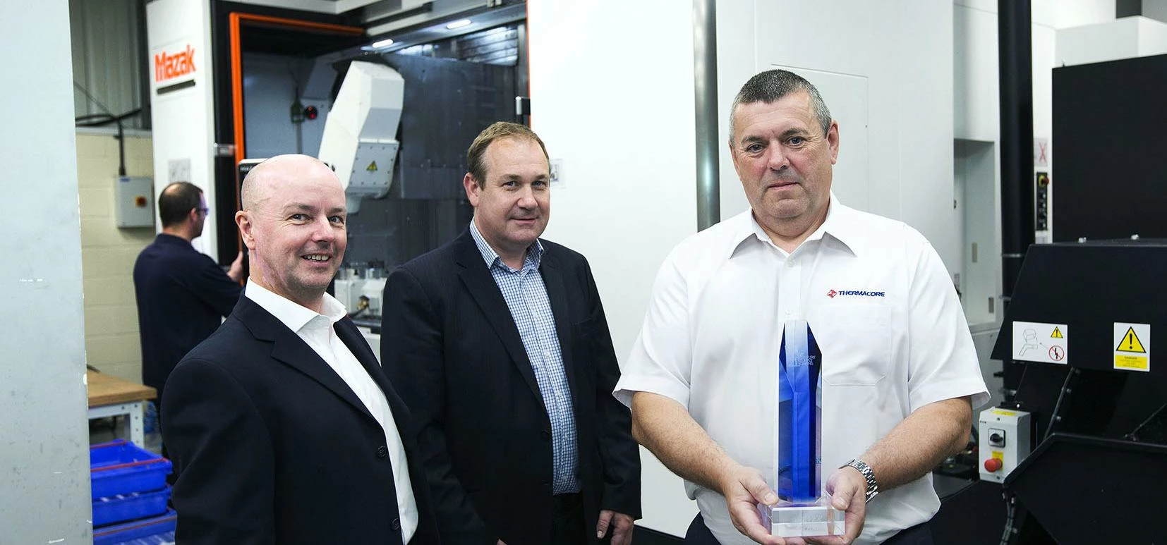 SC21 success: (l-r) Jim Barr, Alan Whittaker (both Business Growth Service) and Mark Robinson (Therm