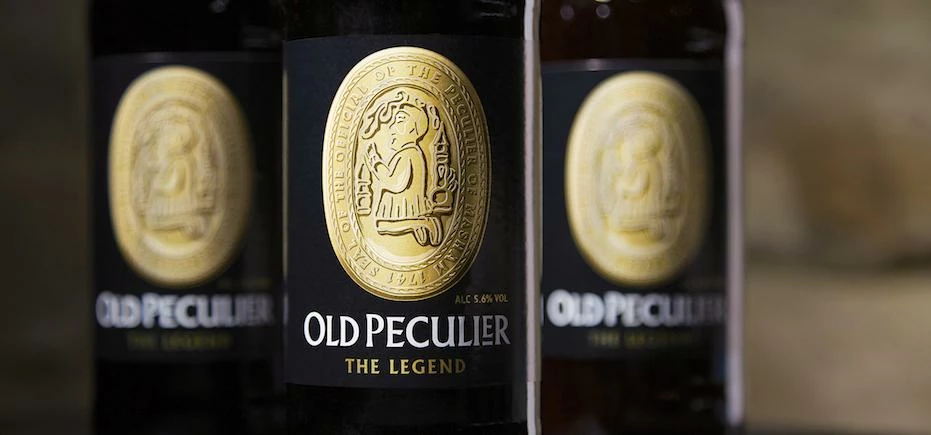 The new look Old Peculier bottle labels.