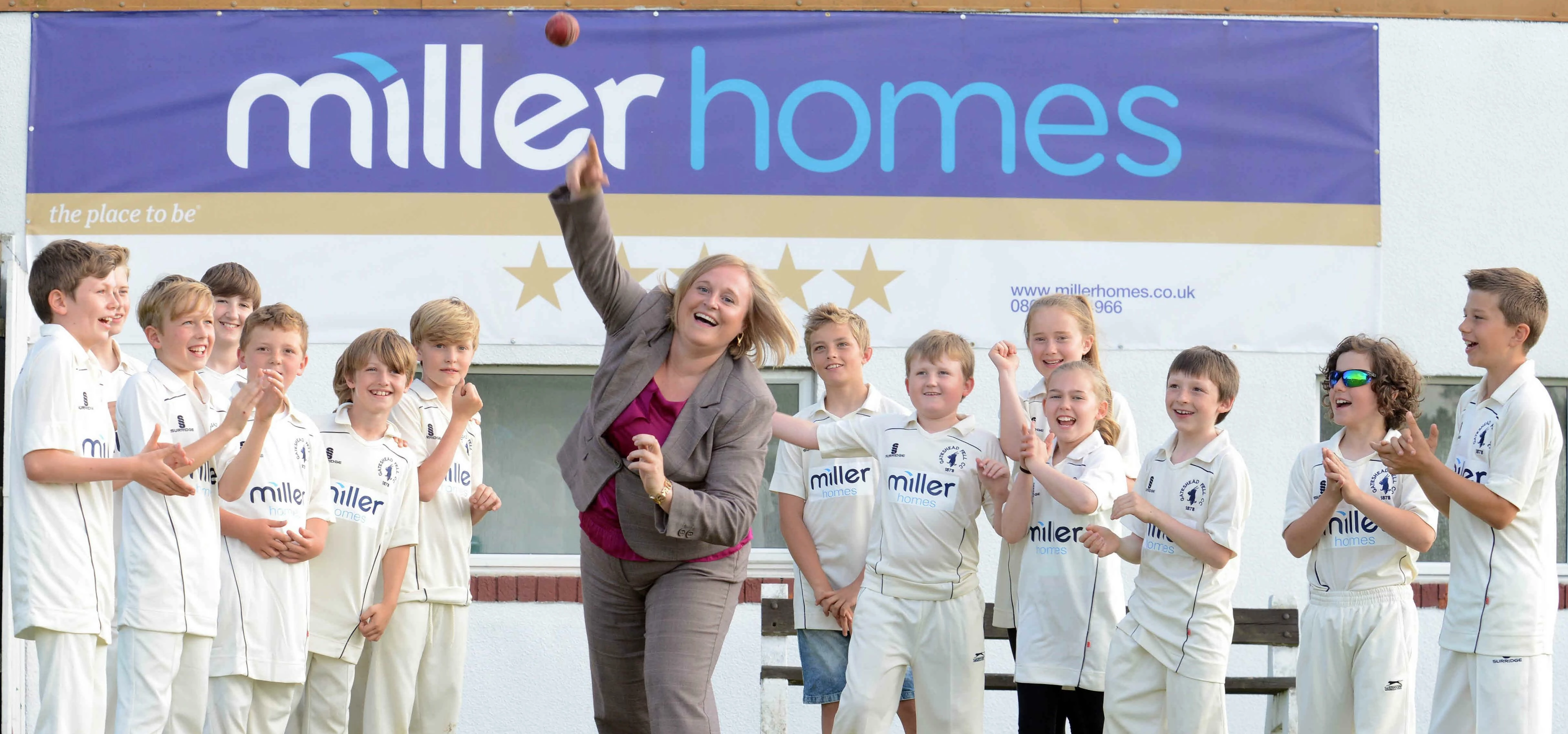 Miller Homes’ Donna Brown with members of Gateshead Fell Cricket Club’s junior team.