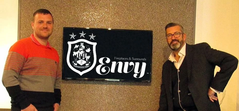 Chris Worsley, owner of Envy Fireplaces, with Huddersfield Town’s commercial director Sean Jarvis. P