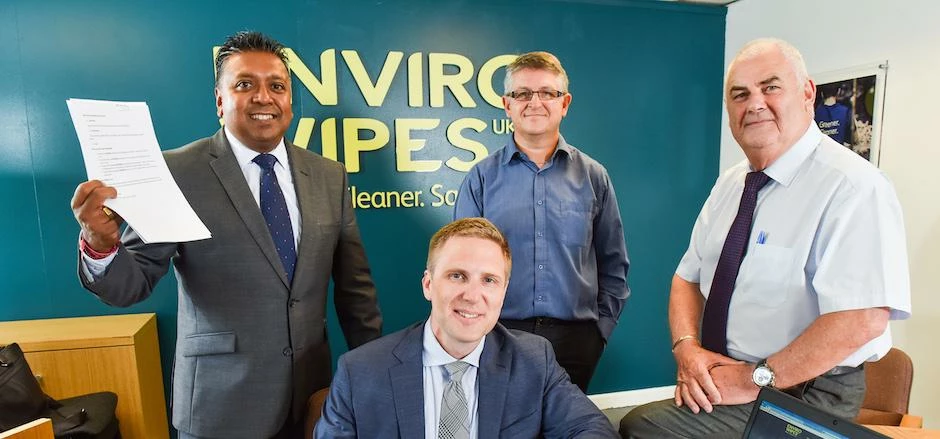 Enviro Wipes directors George Parker (white shirt) and Phil Walker (blue shirt) with Soresh Meeda (