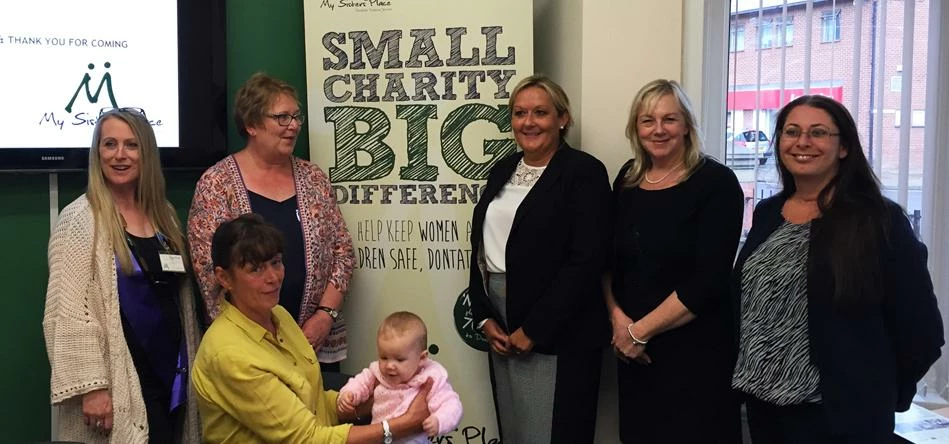 Staff from My Sisters Place with representatives of Tilly Bailey & Irvine Solicitors
