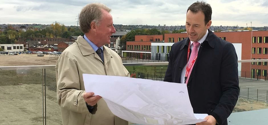 David Hobson, Project Director for Olympic Legacy Park and Darren Pearce go over plans for the site.