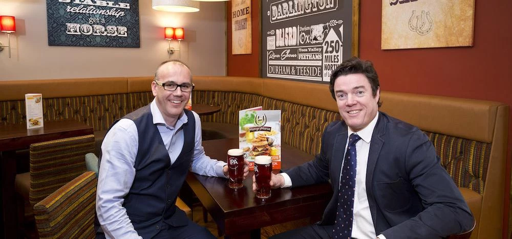Woollen Mill Manager Paul Harrison (left) with Simon Hawkins (right)