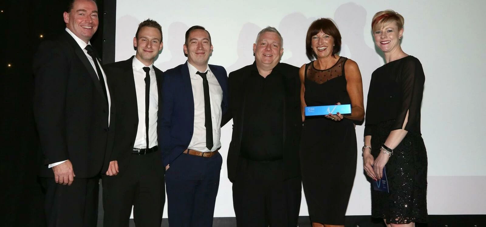 Image caption: Left to Right: Ian Dinning from Lookers plc, sponsor, the FIG team and Sally Steadman