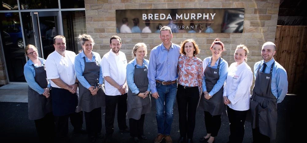 Breda Murphy (fourth from right) with her team