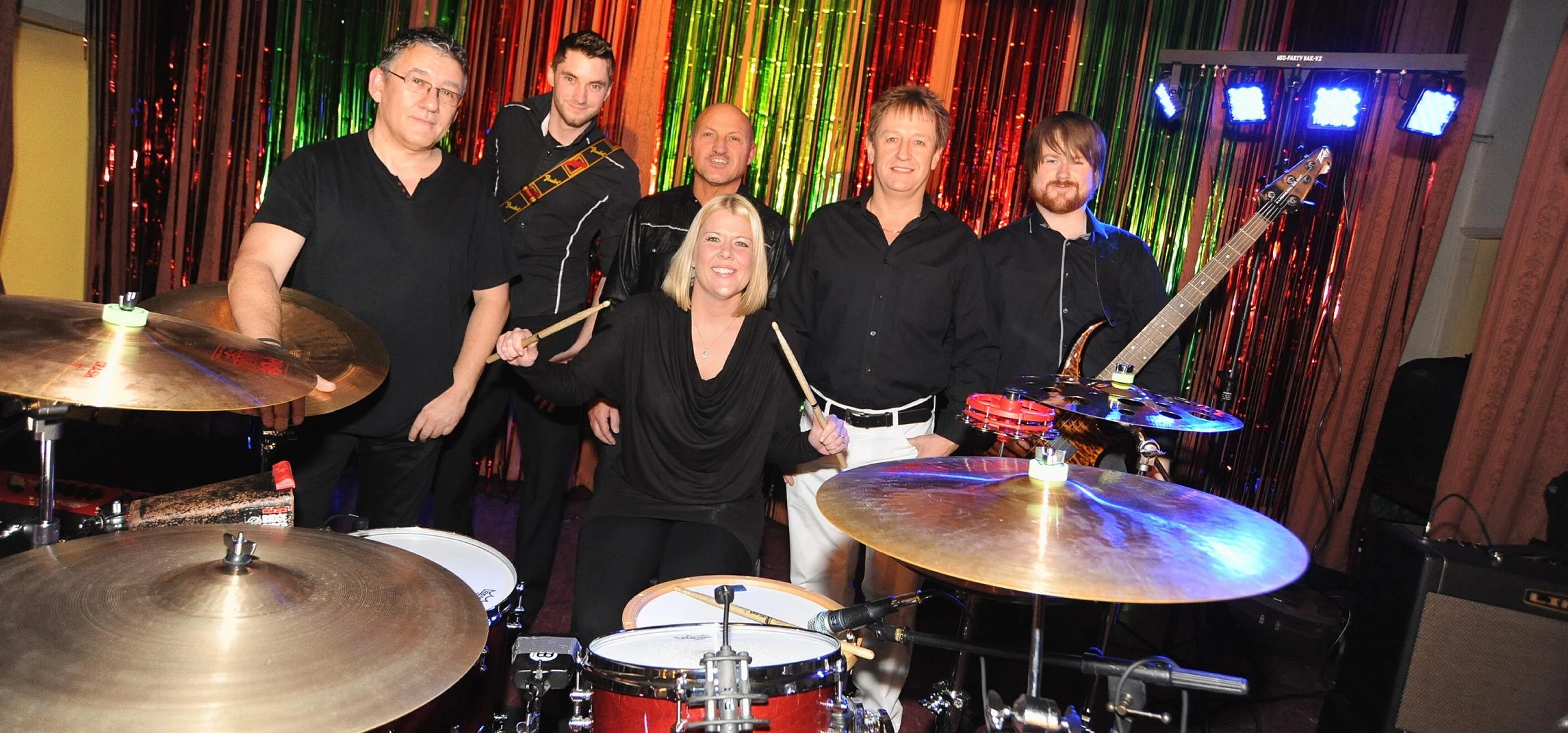 Picture caption: Helen Coombes of HB&O (centre) with Coventry covers band Rewind (from left to right