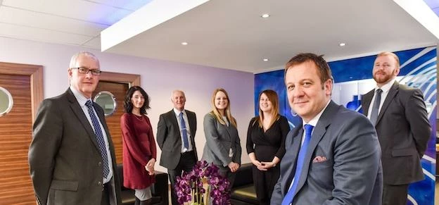 Mark Pepper (right) with the Grosvenor Financial Consultants team