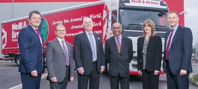 Carl Andrew, logistics director; Colin Moody, managing director; Peter Brown, CEO; Kishor Tailor, ch