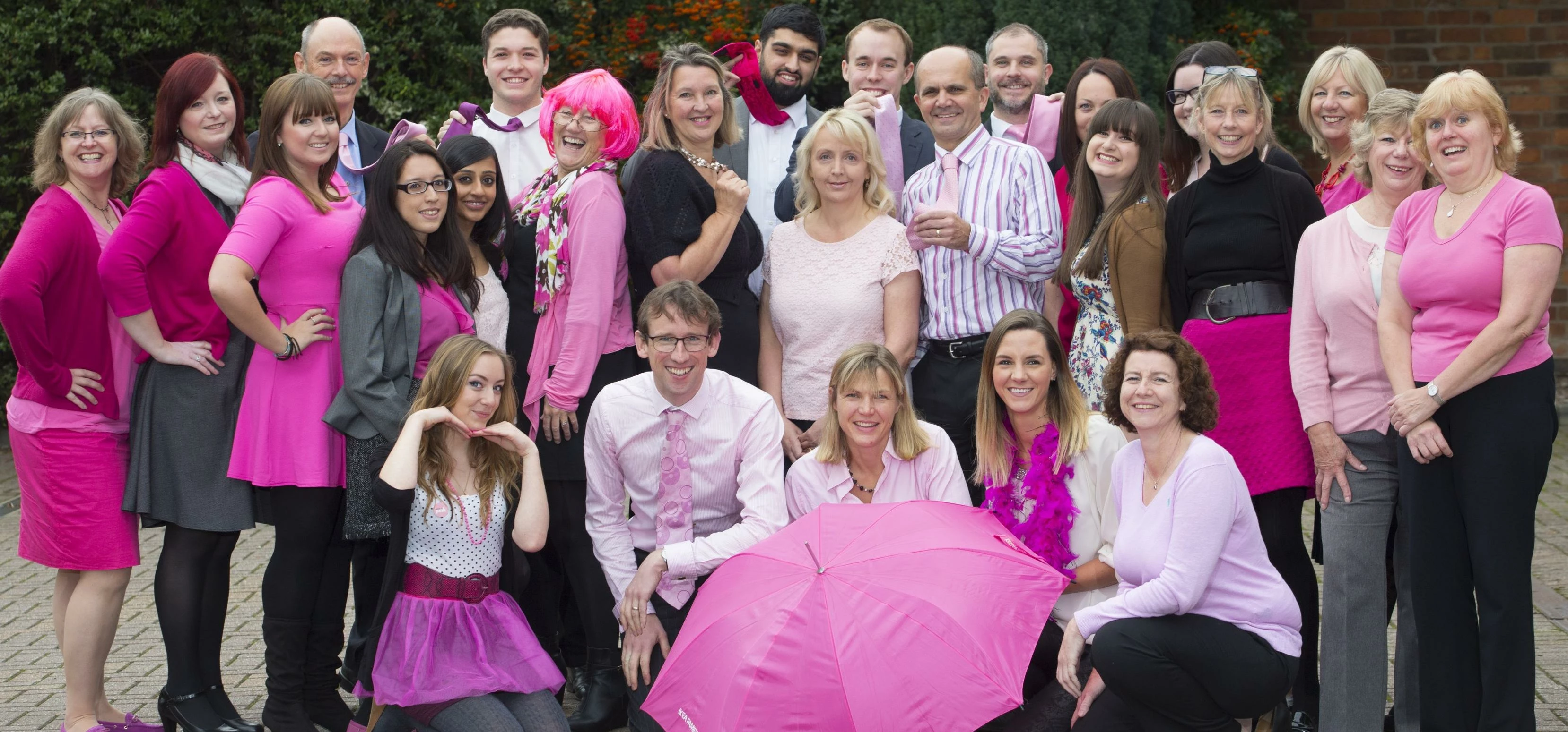 Staff at Lodders’ Stratford office wearing it pink for charity