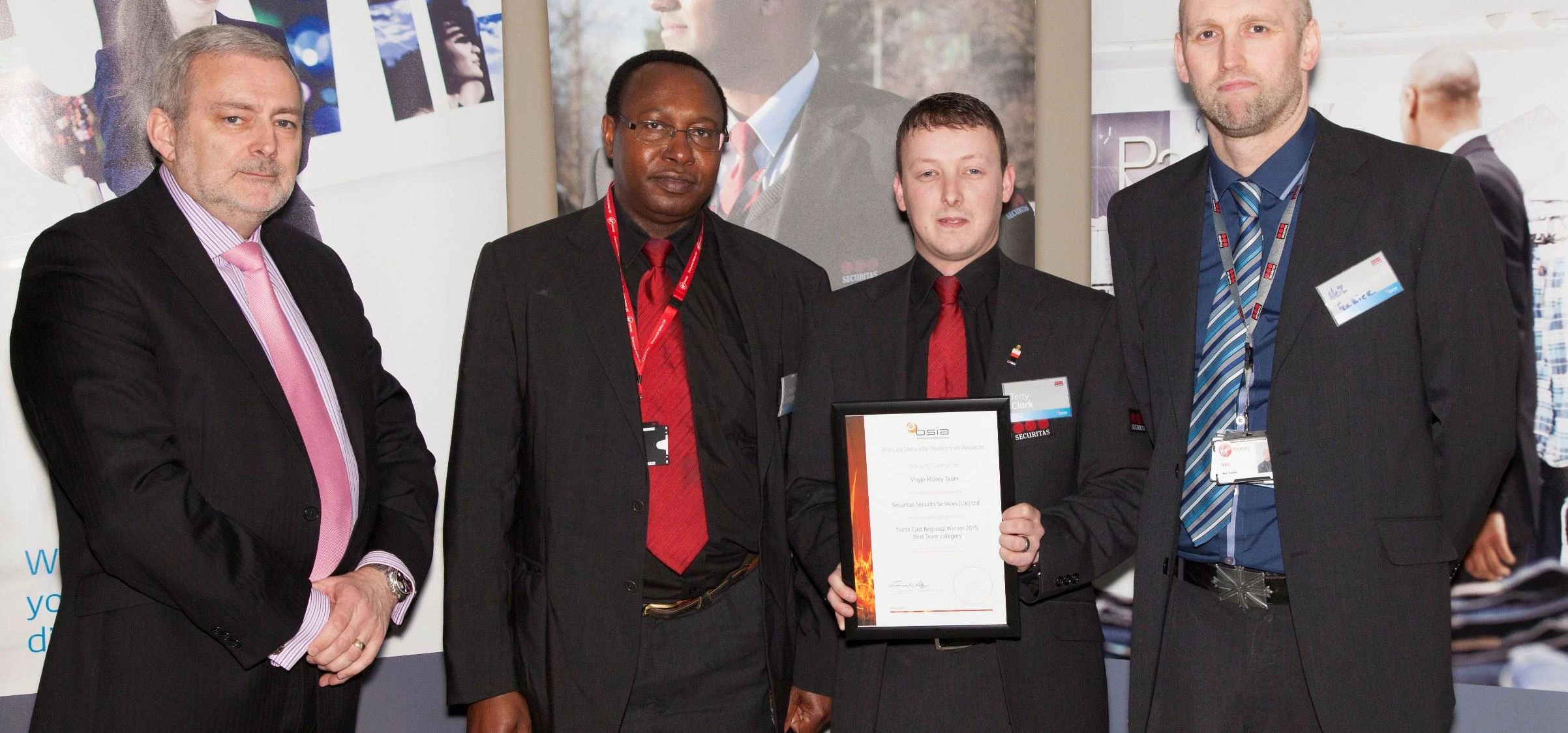 Members of the team receive their award from BSIA Director, Trevor Elliot