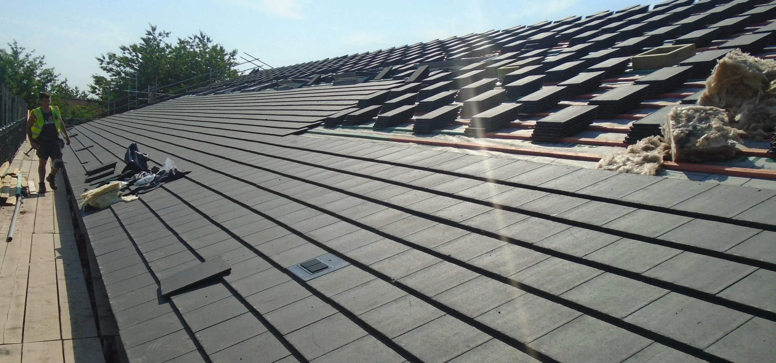 Martin-Brooks’ expert roofers install concrete tiles at Sunnyside Spencer Academy in Nottingham, one