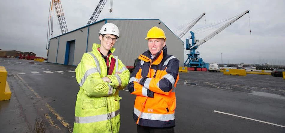 OSBIT Power’s Steve Binny (left) and Alan Todd from Port of Blyth (right) in front of the OSBIT faci
