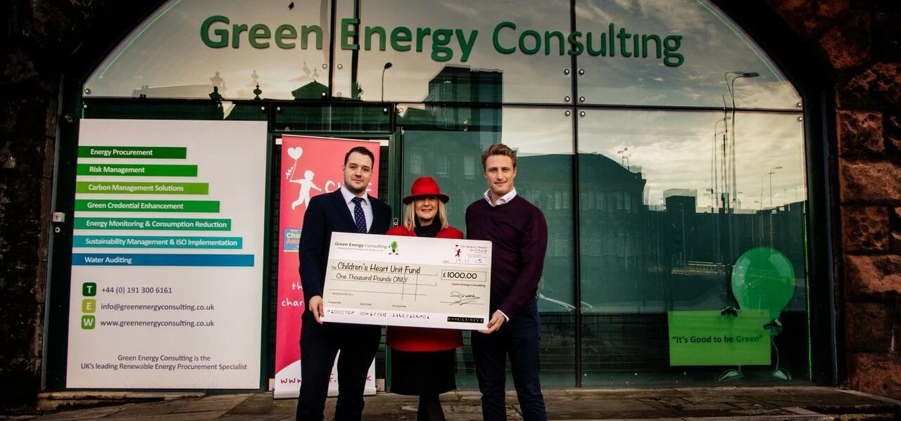 From left: Peter McGirr and Killian Coyne from Green Energy Consulting handing over a cheque to a re