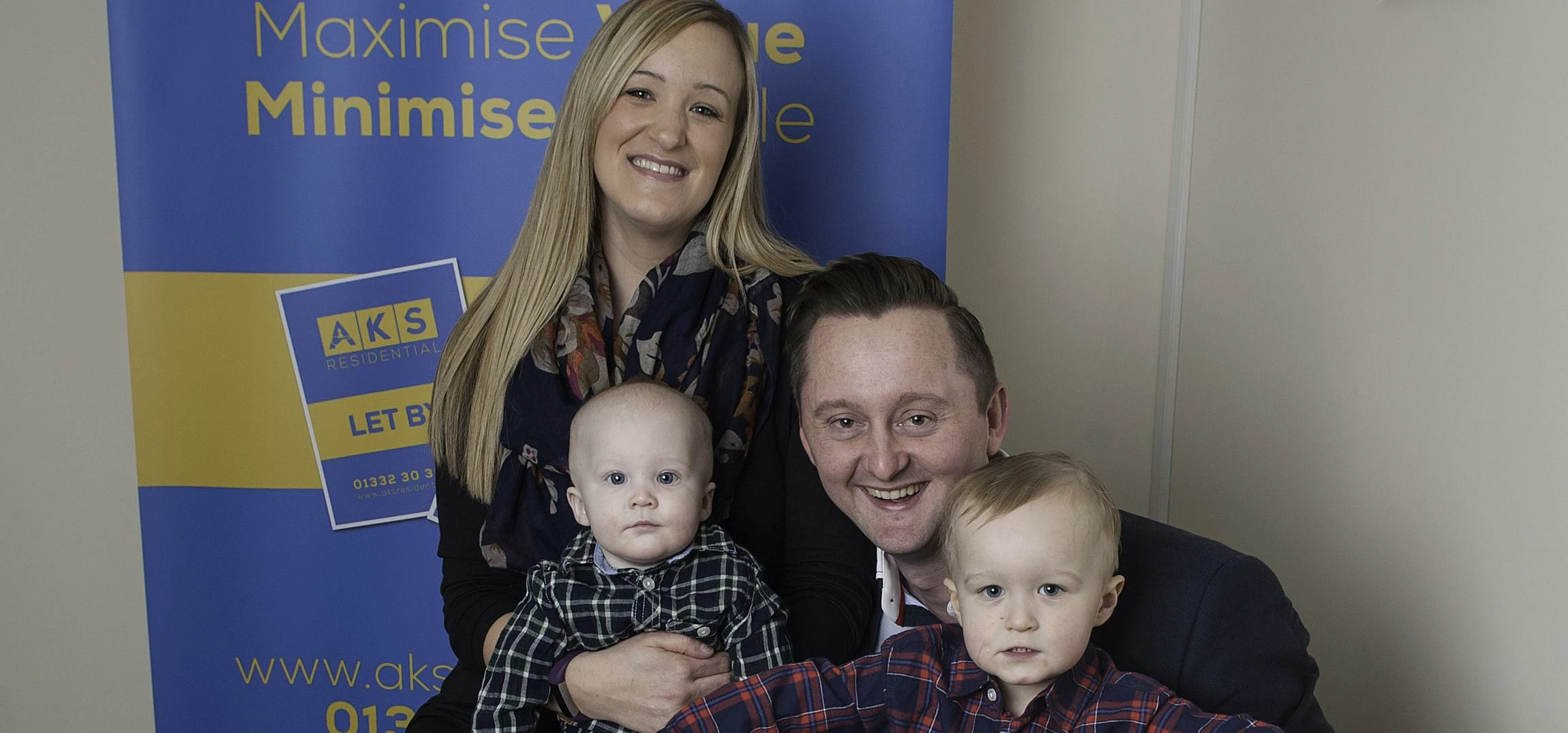 Andrew Sanderson with wife Kathryn and sons Archie and Jack.