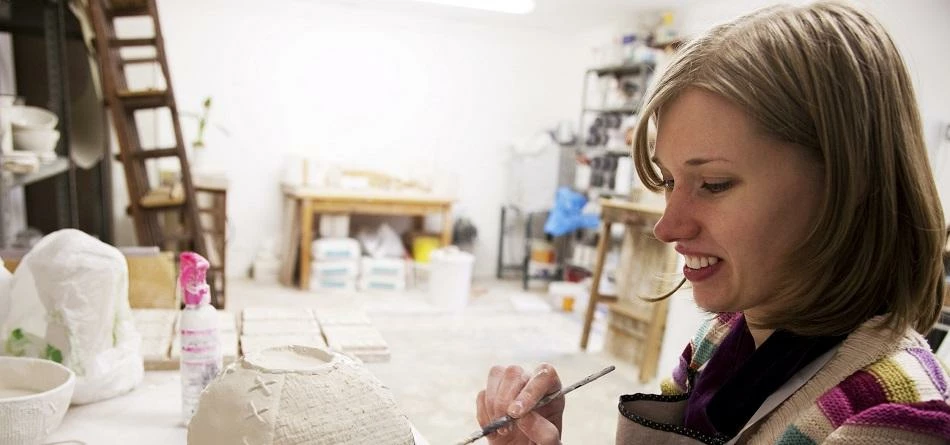 Ceramicist Clare Gage at work in her studio